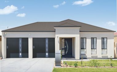 porte-de-garage-sectionnelle-a-refoulement-lateral-en-acier-motorisee-min - Sidonie